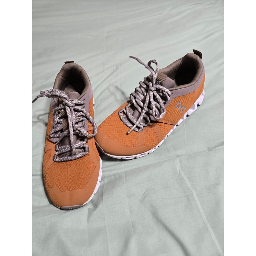 On Running Sneakers in Orange and Gray